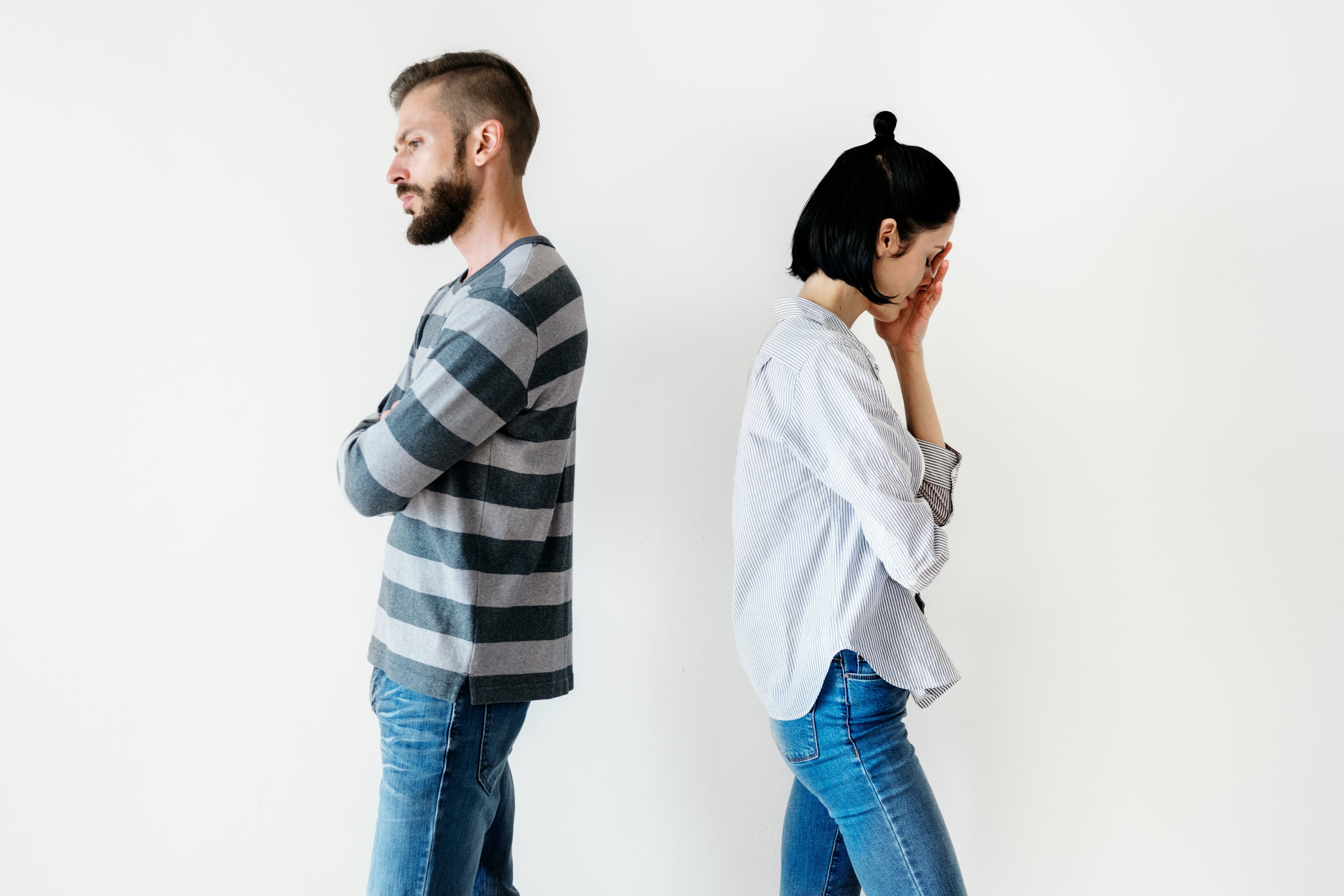 Couple in a thoughtful moment during a difficult family transition